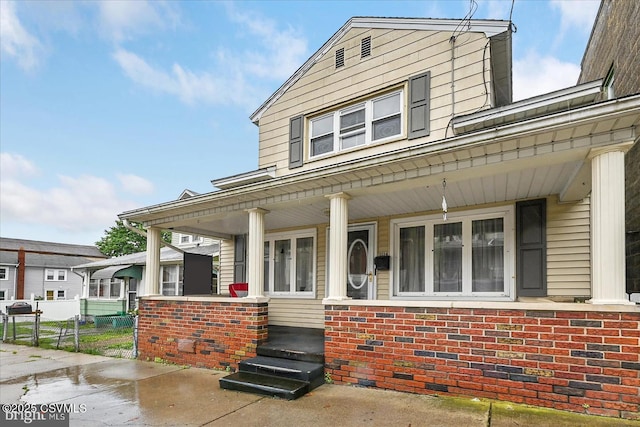 1114 W Arch St, Coal Township, PA 17866 - view of front of property featuring a porch and brick siding