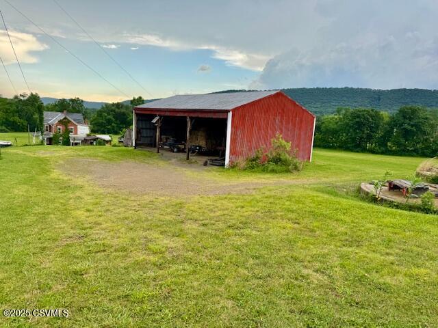 352 Turkey Hill Rd, Elysburg, PA 17824 - view of pole building with a yard and a carport