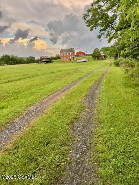352 Turkey Hill Rd, Elysburg, PA 17824 - surrounding community featuring a view of countryside, a yard, and driveway