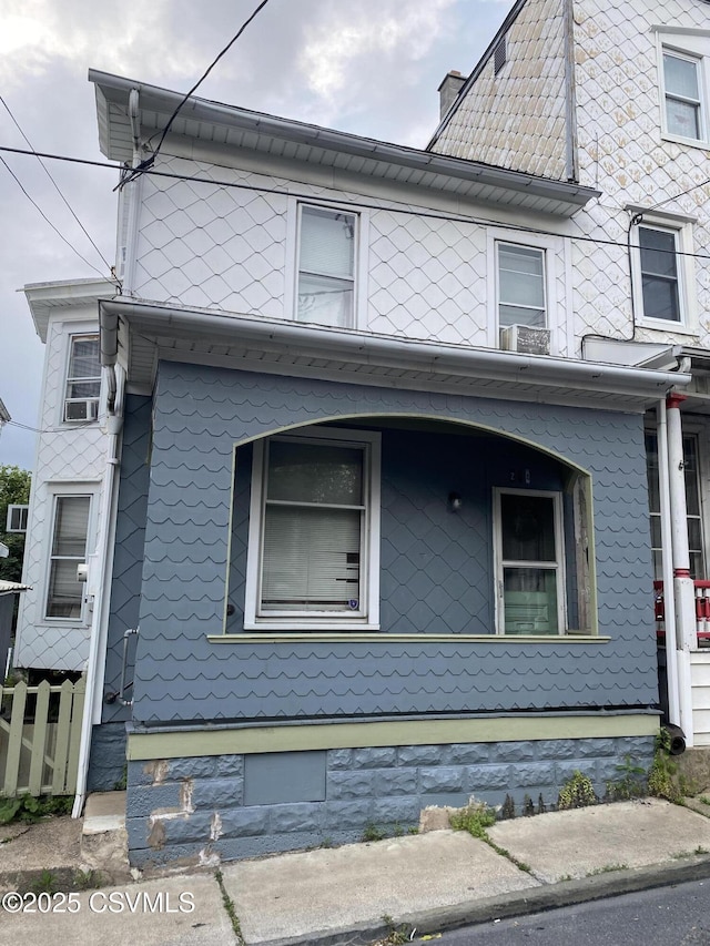 214 N Vine St, Shamokin, PA 17872 - view of side of property with a chimney