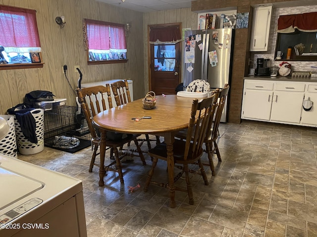 214 N Vine St, Shamokin, PA 17872 - dining area with wood walls and stone tile flooring
