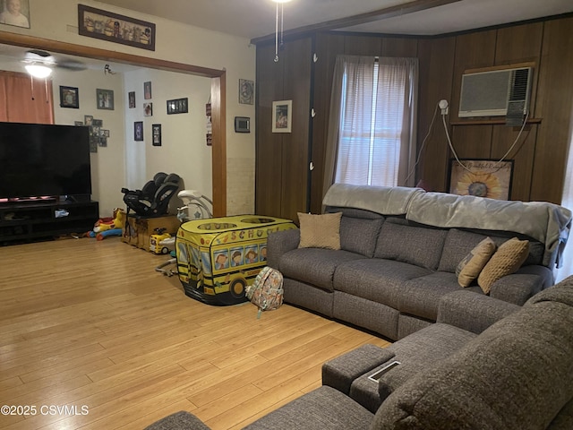 214 N Vine St, Shamokin, PA 17872 - living area featuring wood finished floors and a wall mounted air conditioner