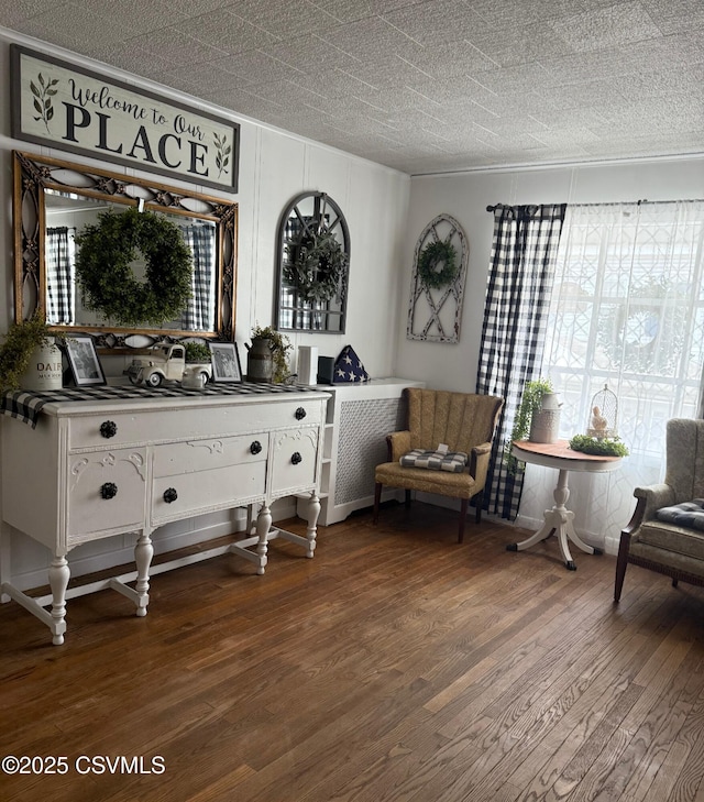 223 N Vine St, Shamokin, PA 17872 - sitting room featuring dark wood-type flooring and ornamental molding