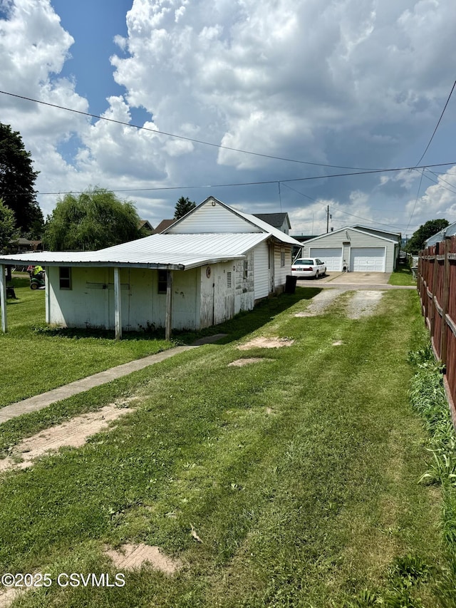 1507 Fairview Ave, Berwick, PA 18603 - view of side of home featuring a detached garage and a metal roof