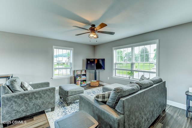5 Williamsburg Blvd, Bloomsburg, PA 17815 - living area featuring healthy amount of natural light, wood finished floors, and a ceiling fan