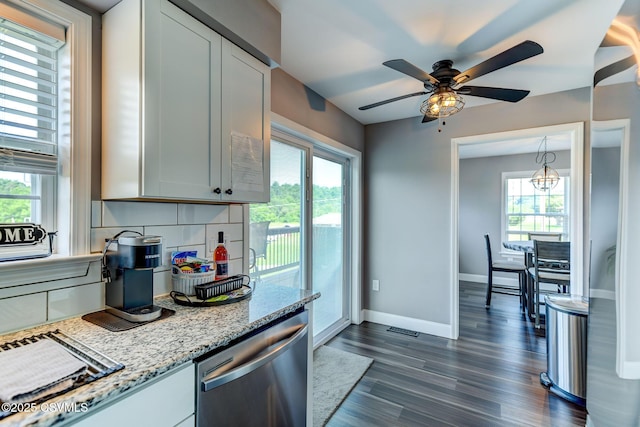 5 Williamsburg Blvd, Bloomsburg, PA 17815 - kitchen with stainless steel dishwasher, a ceiling fan, dark wood-type flooring, light stone countertops, and decorative backsplash