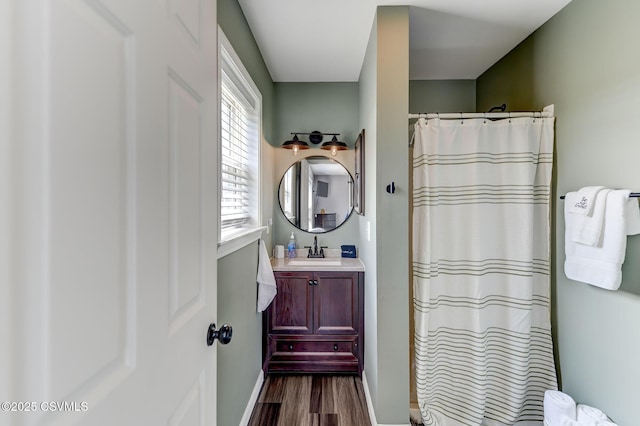 5 Williamsburg Blvd, Bloomsburg, PA 17815 - bathroom with wood finished floors, vanity, and a shower with shower curtain