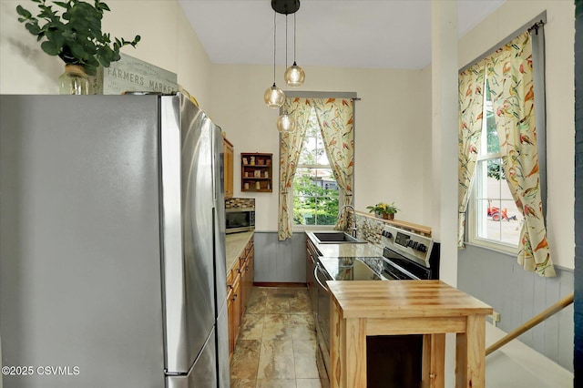 12 State School Rd, Selinsgrove, PA 17870 - kitchen featuring appliances with stainless steel finishes, healthy amount of natural light, pendant lighting, and butcher block countertops