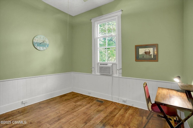 12 State School Rd, Selinsgrove, PA 17870 - unfurnished dining area featuring wainscoting, wood finished floors, and cooling unit