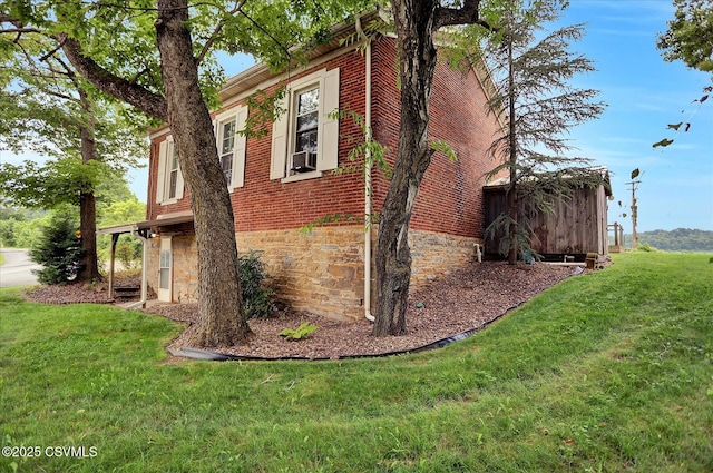 12 State School Rd, Selinsgrove, PA 17870 - view of home's exterior with a lawn, brick siding, and stone siding