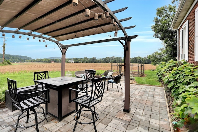 12 State School Rd, Selinsgrove, PA 17870 - view of patio / terrace featuring a pergola, a view of countryside, outdoor dining space, and agricultural area