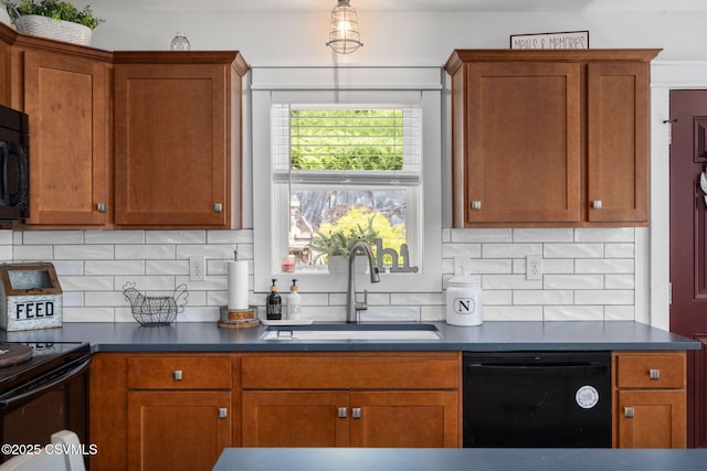 178 Schooners Run, Shickshinny, PA 18655 - kitchen featuring black appliances, dark countertops, brown cabinets, and tasteful backsplash