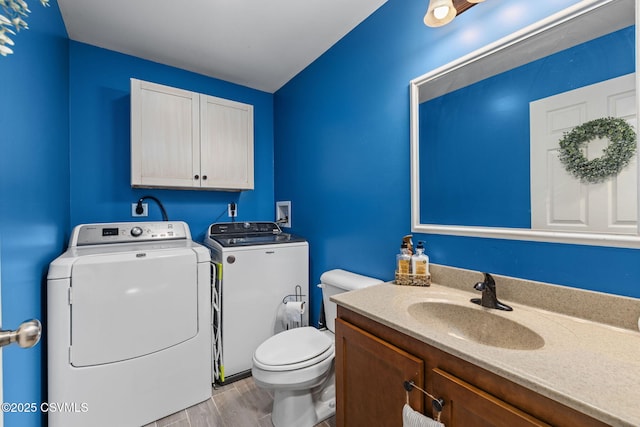 178 Schooners Run, Shickshinny, PA 18655 - half bath featuring separate washer and dryer, vanity, and wood finished floors