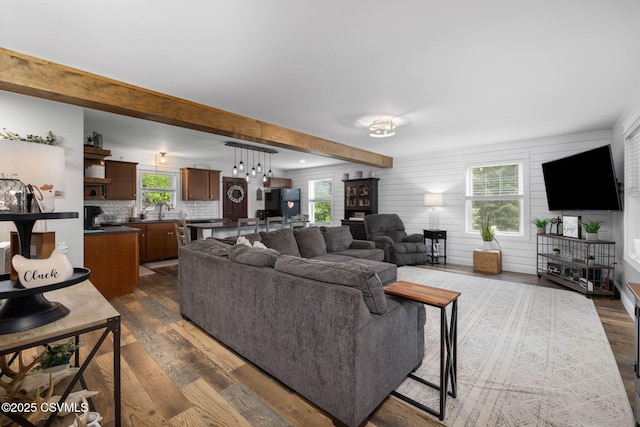 178 Schooners Run, Shickshinny, PA 18655 - living room with dark wood-style floors, beam ceiling, and a fireplace