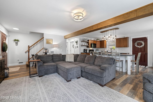 178 Schooners Run, Shickshinny, PA 18655 - living area featuring light wood-type flooring, stairs, and beam ceiling