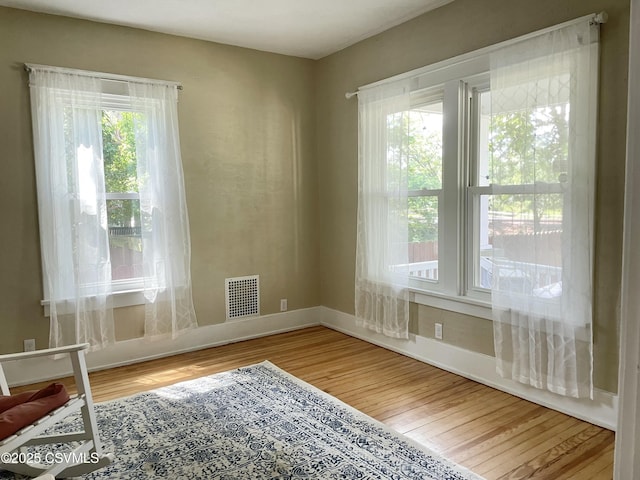 130-132 S 5th St, Lewisburg, PA 17837 - unfurnished room featuring wood finished floors and baseboards