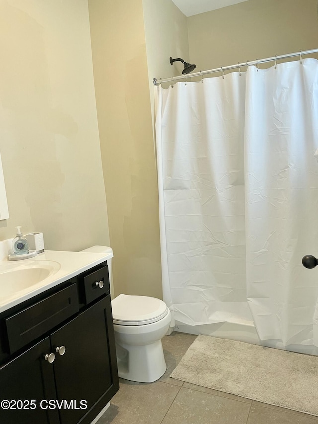 130-132 S 5th St, Lewisburg, PA 17837 - bathroom featuring tile patterned flooring, vanity, and a shower with curtain