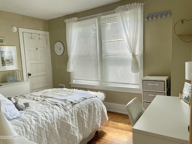 130-132 S 5th St, Lewisburg, PA 17837 - bedroom featuring light wood finished floors and baseboards
