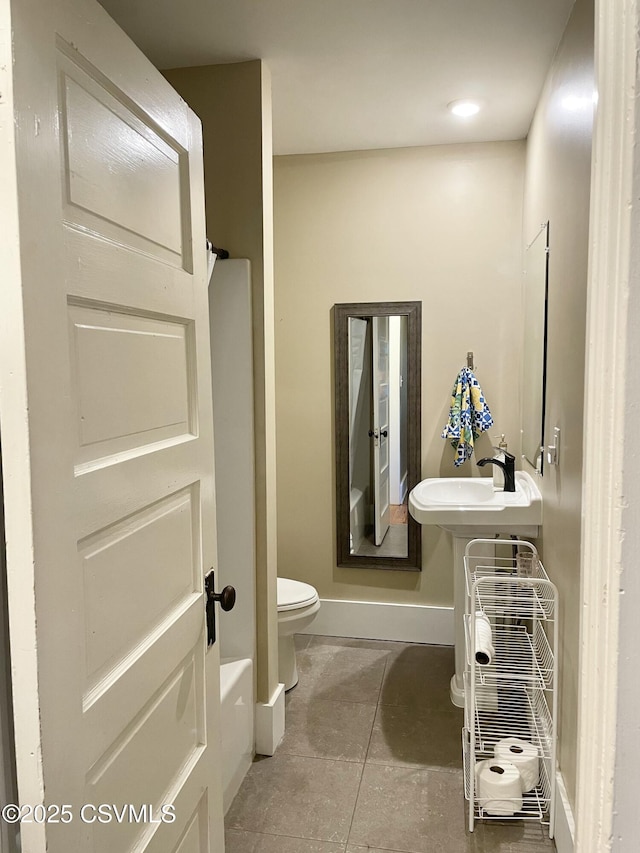 130-132 S 5th St, Lewisburg, PA 17837 - bathroom featuring tile patterned floors and a tub to relax in