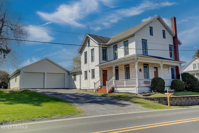 4429 Rte 204, Selinsgrove, PA 17870 - view of front of home featuring an outdoor structure, covered porch, a garage, a chimney, and a front lawn