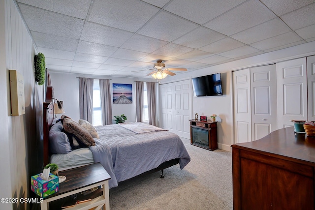 4429 Rte 204, Selinsgrove, PA 17870 - bedroom with multiple closets, light colored carpet, a drop ceiling, and ceiling fan