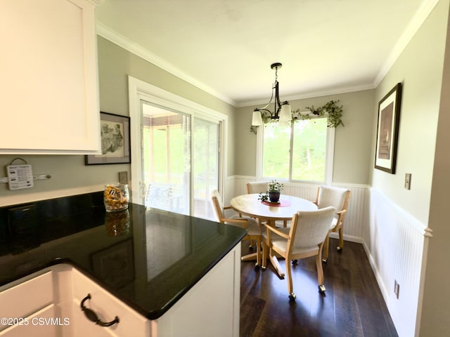101 Twig Ln, Sunbury, PA 17801 - dining area featuring wainscoting, a chandelier, ornamental molding, and dark wood-style flooring