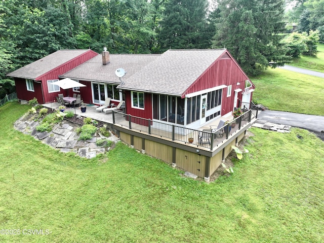 101 Twig Ln, Sunbury, PA 17801 - back of house with a shingled roof, a yard, a wooden deck, a patio area, and a chimney