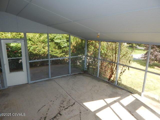 404 W Center St, Elysburg, PA 17824 - unfurnished sunroom with healthy amount of natural light and lofted ceiling