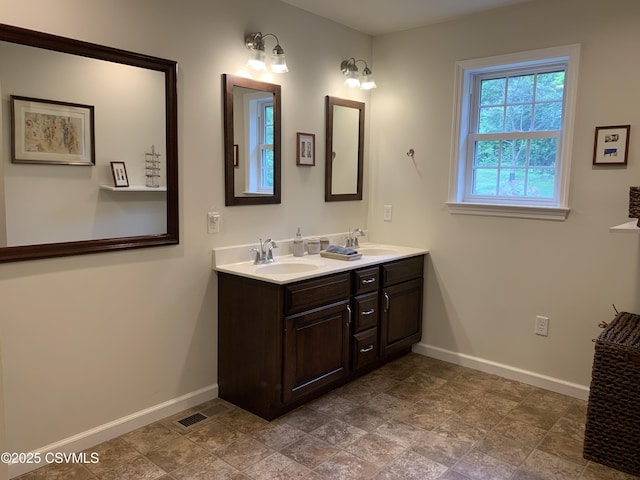 3 Walnut Rd, Lewisburg, PA 17837 - full bathroom featuring baseboards and double vanity