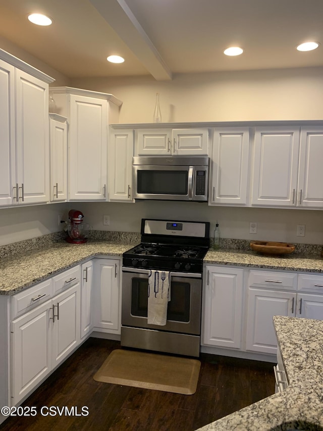 3 Walnut Rd, Lewisburg, PA 17837 - kitchen featuring stainless steel appliances, dark wood-style floors, white cabinets, recessed lighting, and light stone counters