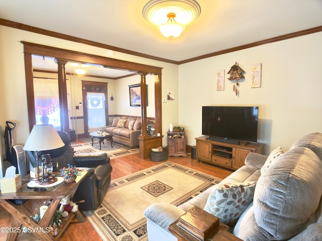 230 S 6th St, Shamokin, PA 17872 - living area featuring light wood-type flooring, decorative columns, and crown molding