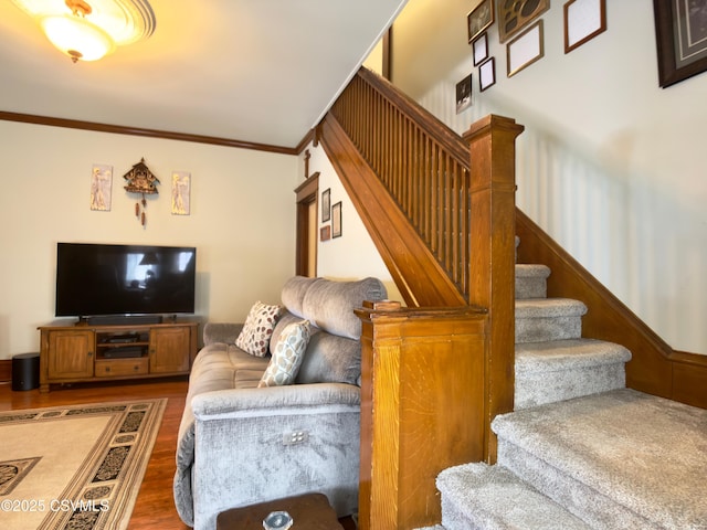 230 S 6th St, Shamokin, PA 17872 - living room featuring wood finished floors, stairs, and ornamental molding