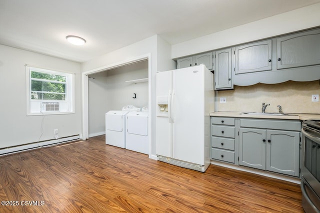503 E Brugler Ave, Bloomsburg, PA 17815 - kitchen with gray cabinetry, white fridge with ice dispenser, baseboard heating, and light countertops