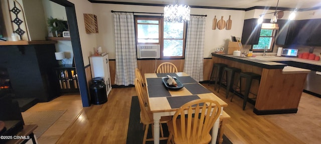 97 Maplewood Rd, Berwick, PA 18603 - dining space featuring cooling unit, light wood-style floors, and a chandelier