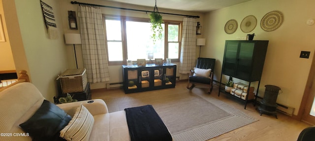 97 Maplewood Rd, Berwick, PA 18603 - living area with a baseboard radiator, wood finished floors, and baseboard heating