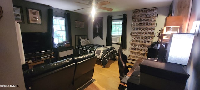 97 Maplewood Rd, Berwick, PA 18603 - bedroom with wood finished floors, multiple windows, and a ceiling fan