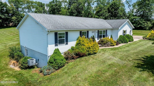 95 Five Points Rd, Muncy, PA 17756 - ranch-style house featuring a front yard, roof with shingles, and view of wooded area
