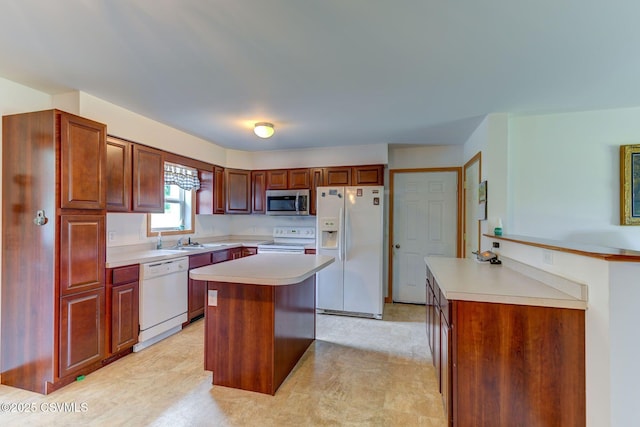 95 Five Points Rd, Muncy, PA 17756 - kitchen featuring white appliances, light countertops, a center island, and light floors