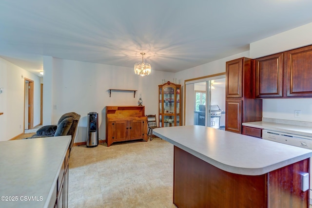 95 Five Points Rd, Muncy, PA 17756 - kitchen featuring light countertops, light floors, hanging light fixtures, a center island, and a chandelier