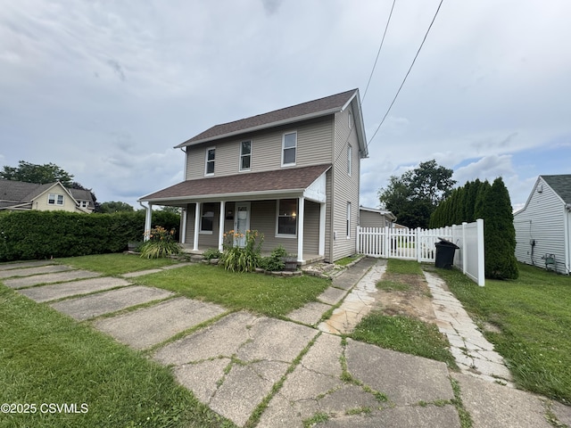 1715 Spring Garden Ave, Berwick, PA 18603 - view of front of house featuring covered porch, driveway, and a shingled roof