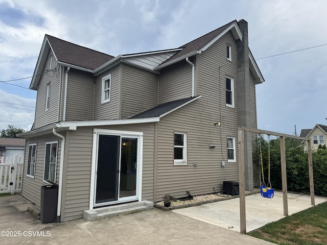 1715 Spring Garden Ave, Berwick, PA 18603 - back of property featuring a patio and a shingled roof