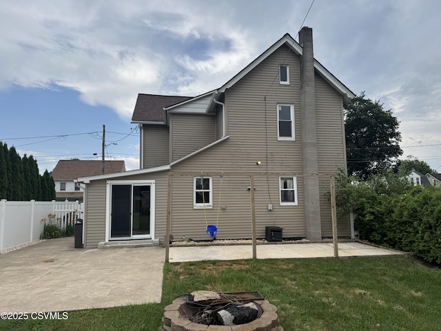 1715 Spring Garden Ave, Berwick, PA 18603 - rear view of house with an outdoor fire pit, a patio area, and a chimney