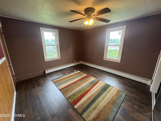 1715 Spring Garden Ave, Berwick, PA 18603 - empty room with baseboard heating, hardwood / wood-style flooring, and ceiling fan