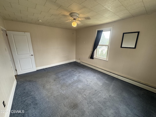 1715 Spring Garden Ave, Berwick, PA 18603 - empty room with dark colored carpet, a ceiling fan, and a baseboard radiator