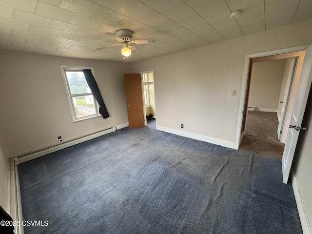 1715 Spring Garden Ave, Berwick, PA 18603 - unfurnished bedroom featuring a baseboard radiator, carpet flooring, and a ceiling fan