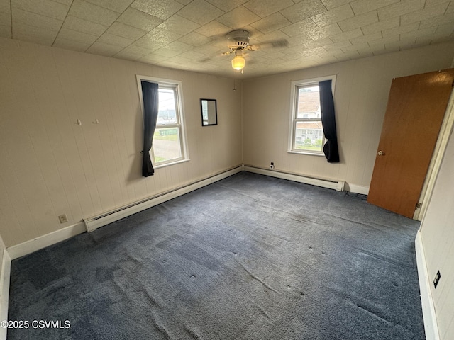 1715 Spring Garden Ave, Berwick, PA 18603 - unfurnished room with healthy amount of natural light, dark carpet, and a ceiling fan