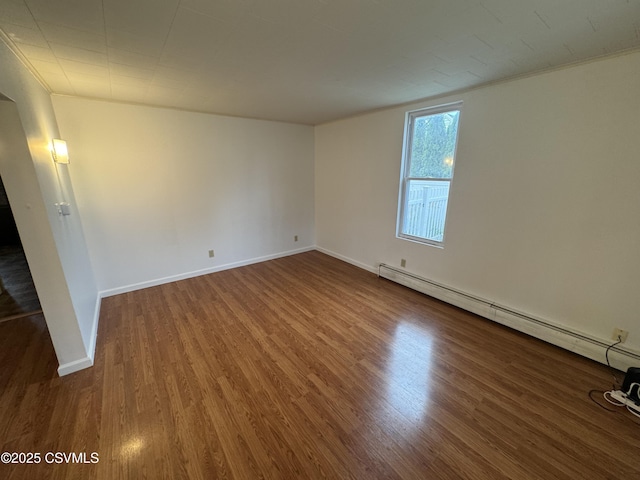 1715 Spring Garden Ave, Berwick, PA 18603 - unfurnished room with wood finished floors and baseboard heating