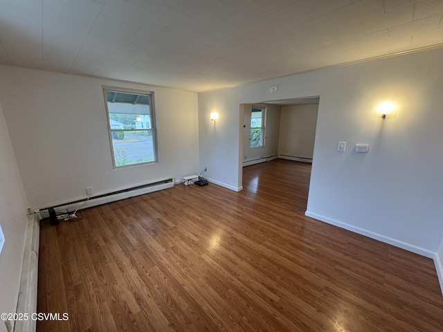 1715 Spring Garden Ave, Berwick, PA 18603 - unfurnished room with baseboard heating and wood finished floors