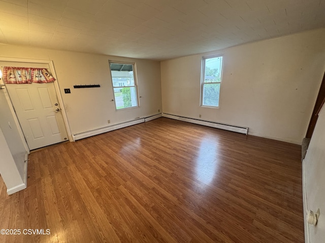 1715 Spring Garden Ave, Berwick, PA 18603 - unfurnished room with wood finished floors and baseboard heating