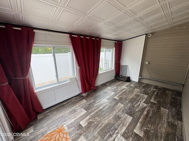 1715 Spring Garden Ave, Berwick, PA 18603 - unfurnished room featuring wood finished floors, an ornate ceiling, and wooden walls